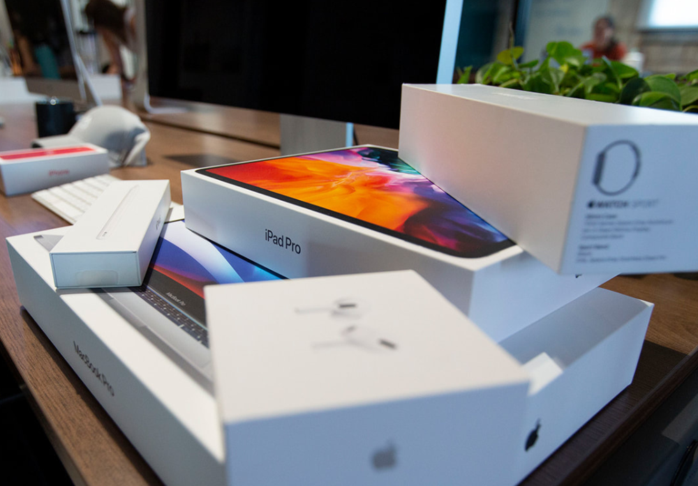 apple devices in boxes