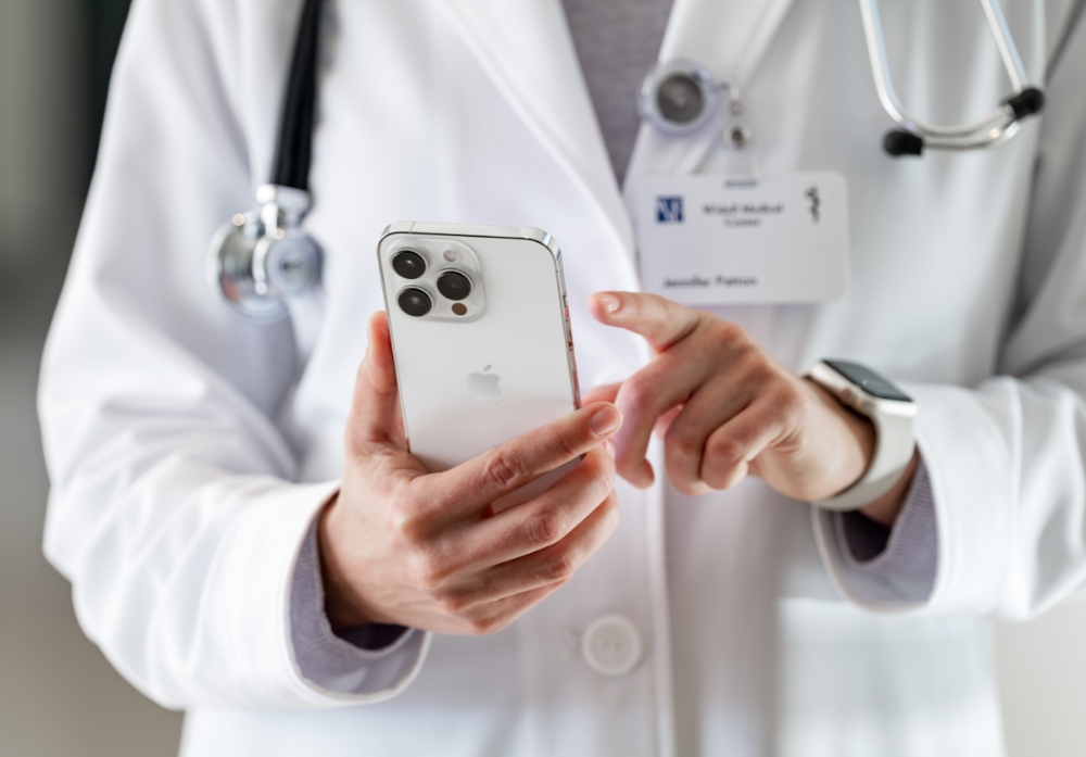 a doctor with an iphone