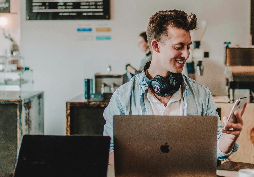 A person using a Macbook at work