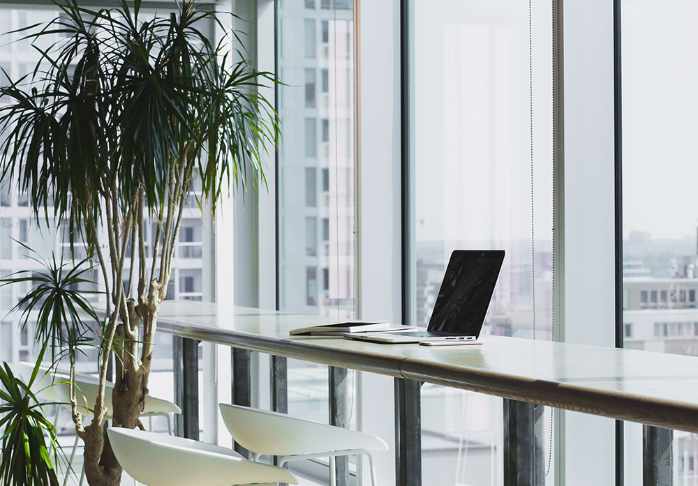 modern office with a laptop in the table